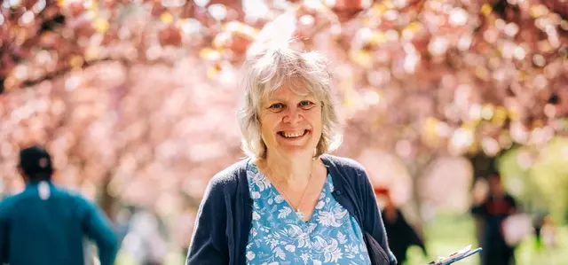 Smiling woman in the park in springtime