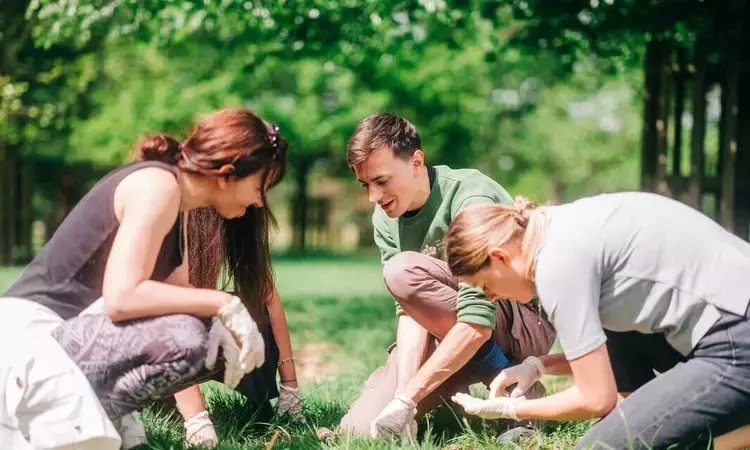 People looking at dung beetles