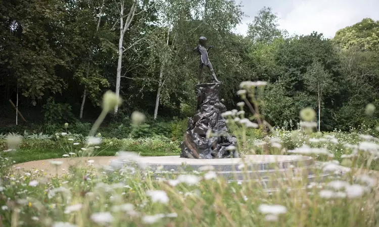 Peter pan statue in Kensington Gardens in summertime