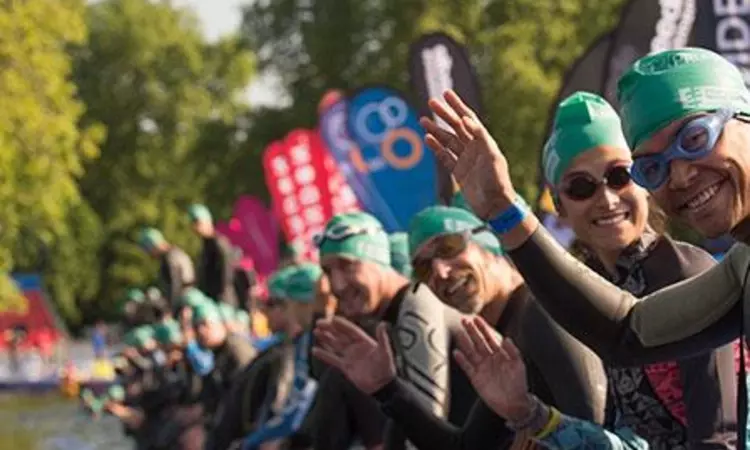 Swimmers waving during Swim Serpentine 2023